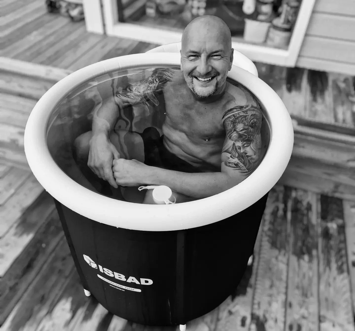 David ice bathing in ISBAD Premium on a deck